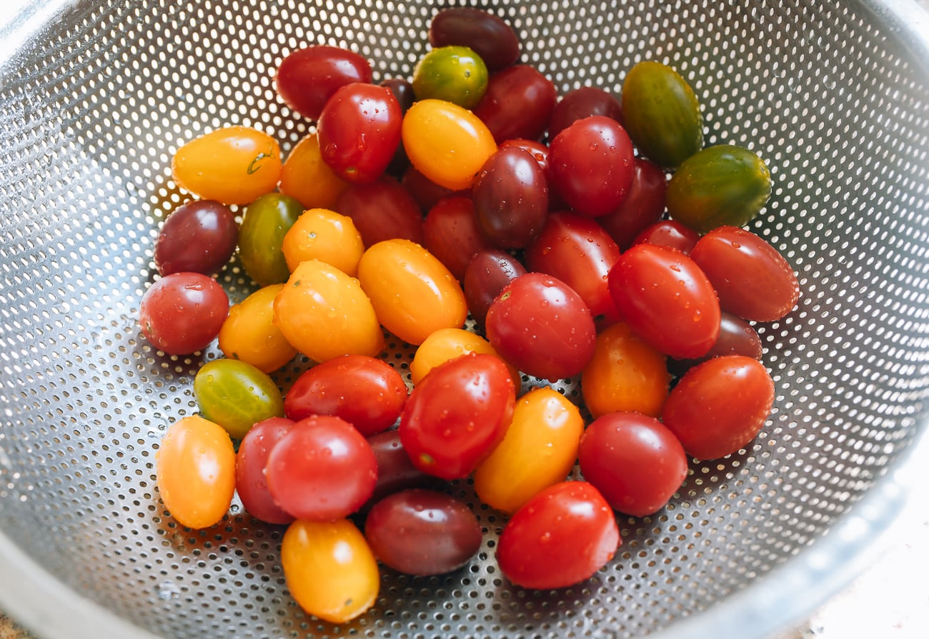 multi-colored grape tomatoes in colander